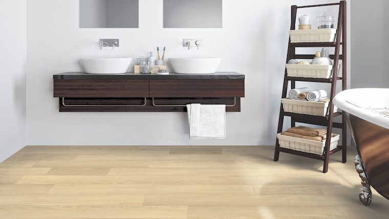 Luxury vinyl plank flooring in a bright bathroom